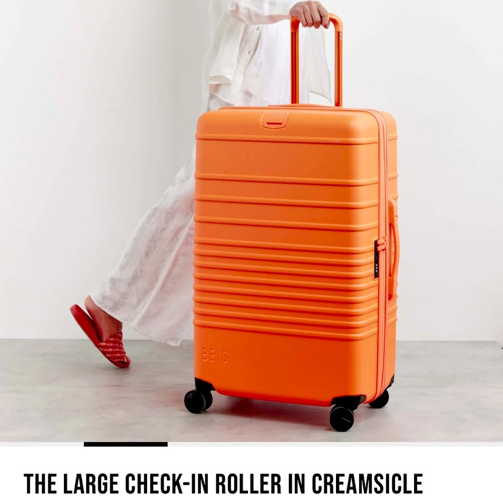 SOLD 🛑 BEIS — Large Check-In Roller in Creamsicle Orange